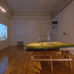 Installation view, Stonehenge II (model), mixed media, 2002-3; First Woman on the Moon, video, 1999, 'Publicness', ICA, 2003.jpg